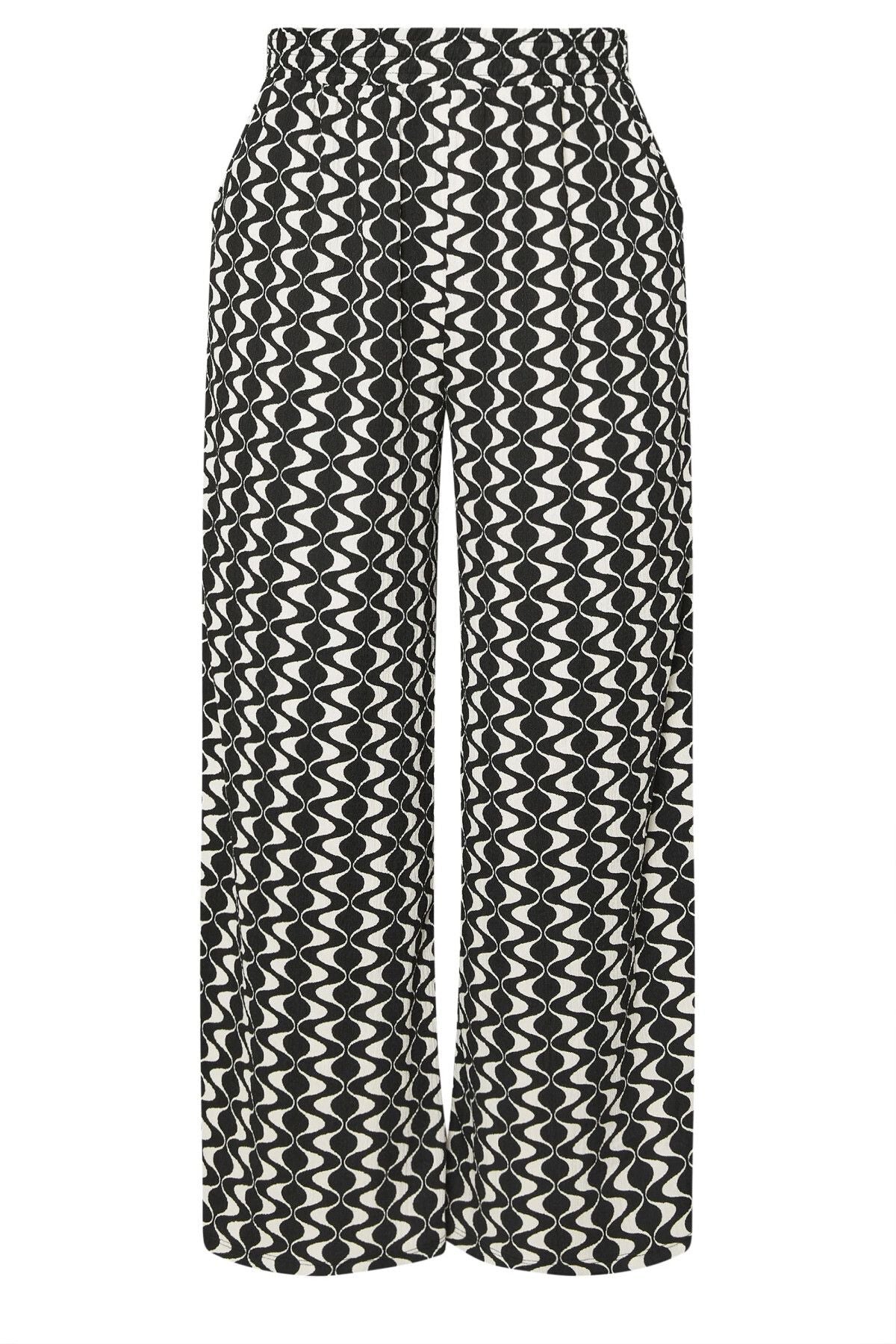 Büyük Beden Beli Lastikli Cepli Dsenli Bol Paça Pantolon 303970