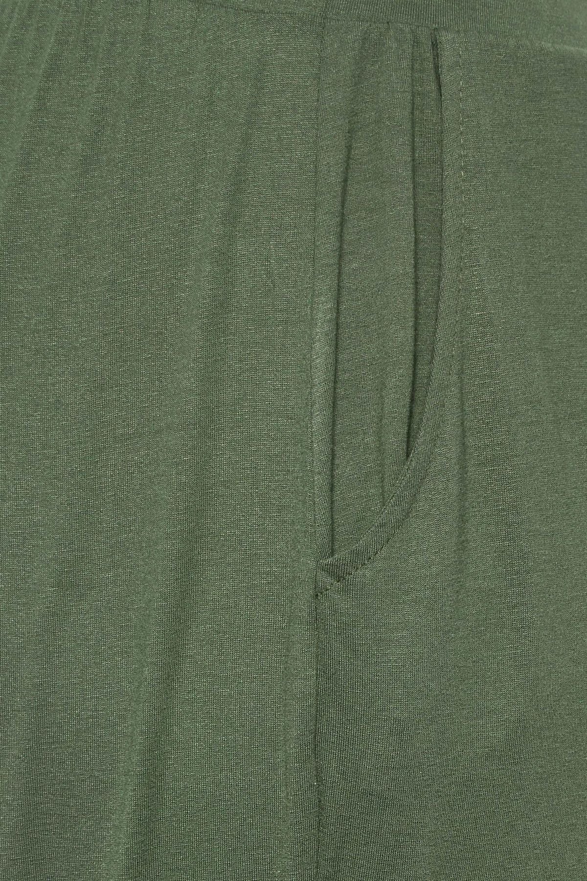 Büyük Beden Yırtmaçlı Paçası Lastikli Yırtmaç Detaylı Likralı Pantolon 144880