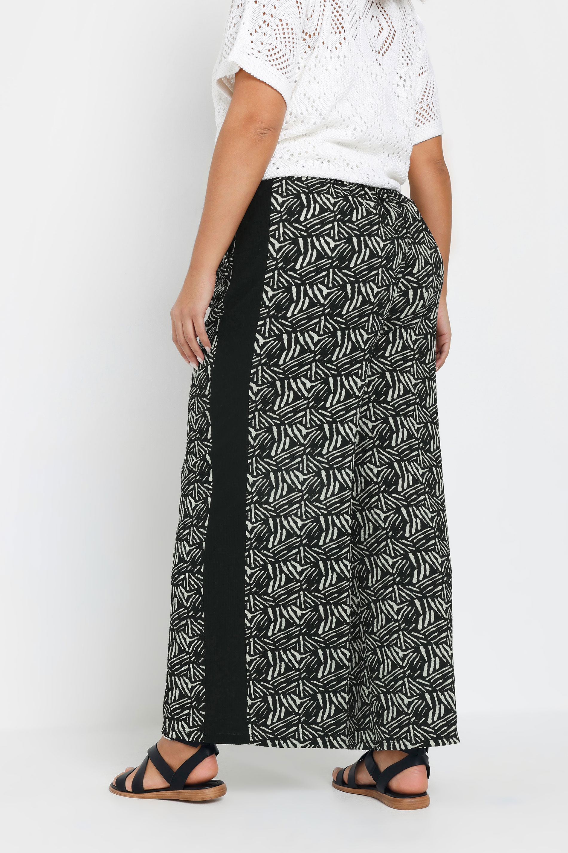 Büyük Beden Bol Paça Beli Lastikli Cepli Desenli Pantolon 303772